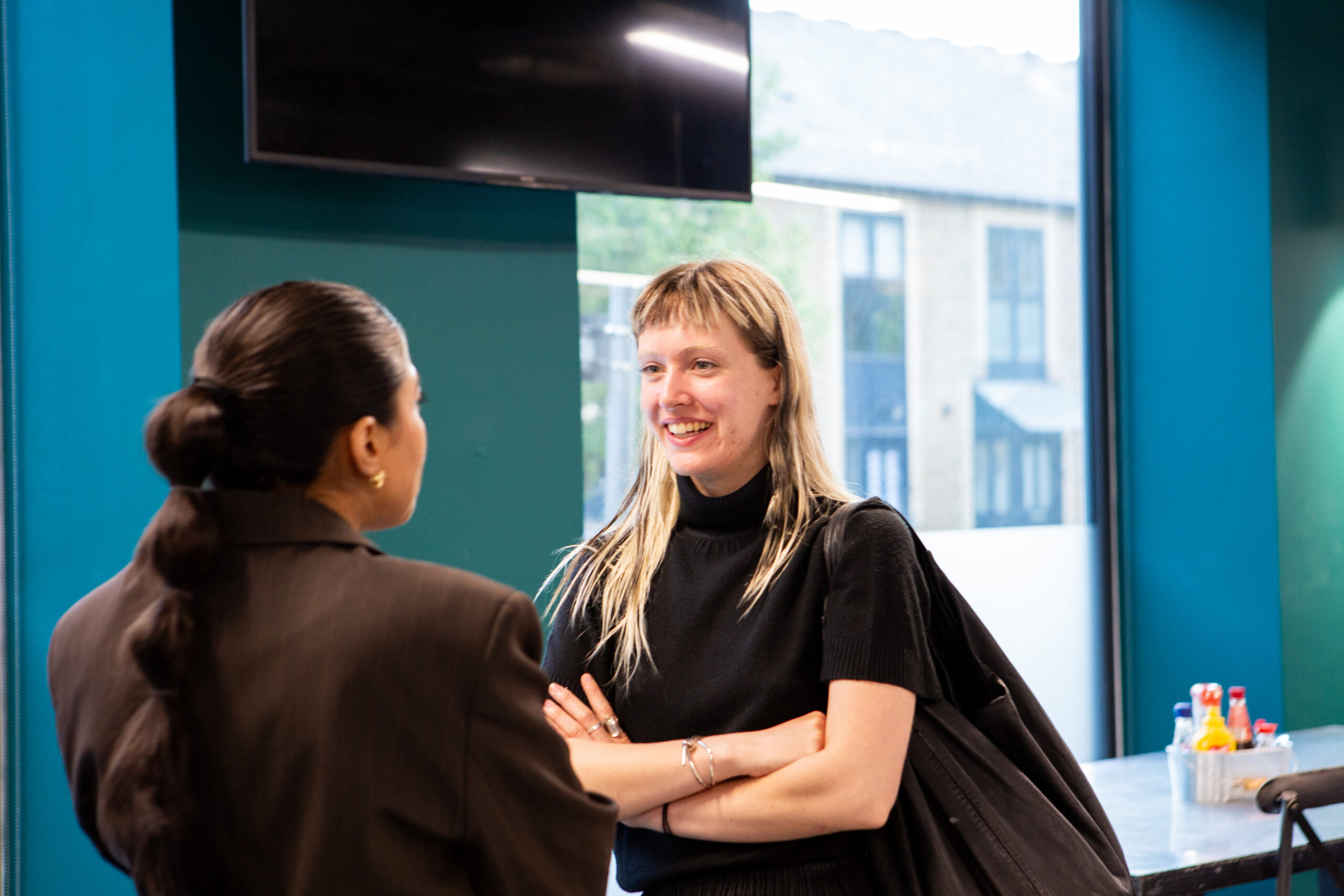 Women talking in the workplace